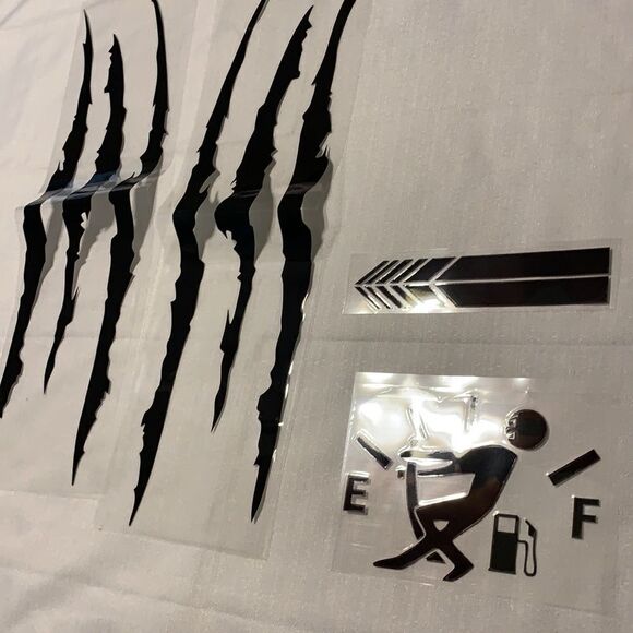 Four packs of 5-piece car stickers.  Total of 20 pieces - Picture 2 of 3